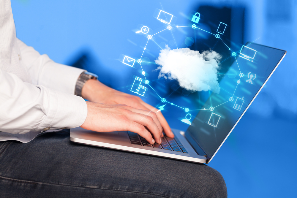 Hand working with a Cloud Computing diagram, new technology concept Hand working with a Cloud Computing diagram, new technology concept